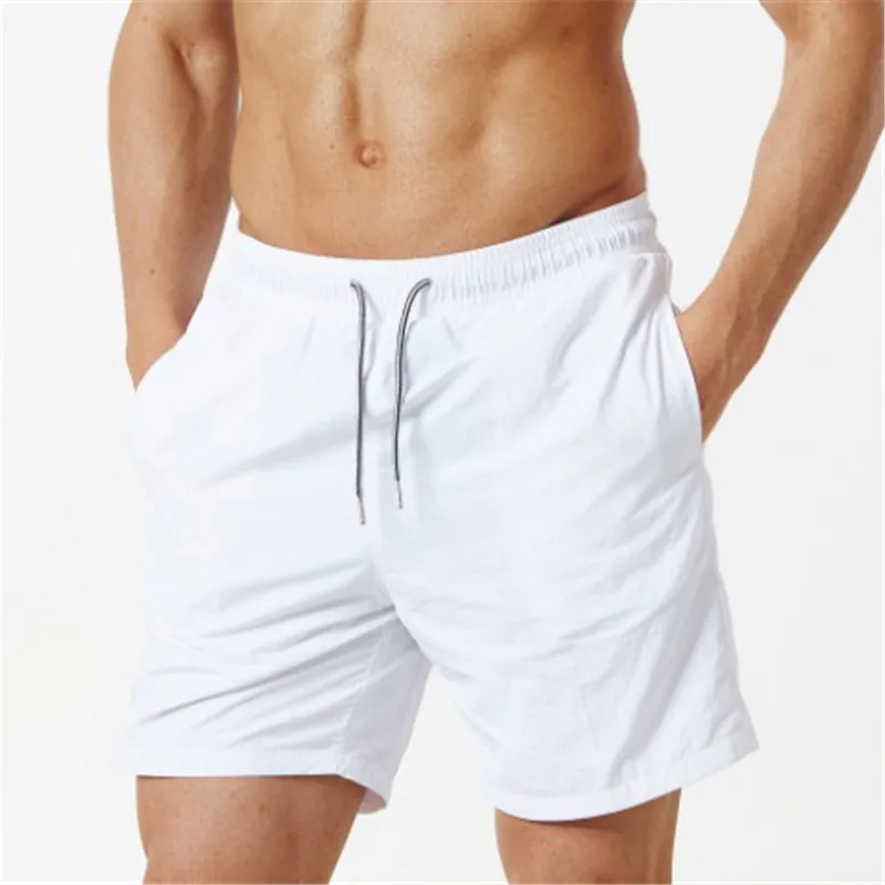 

Men's Solid Color Nylon Casual Wear Fashion Plus Size Shorts Sports White Shorts