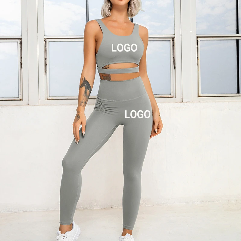 

Eco-friendly Recycled Nylon Fabric Tik Tok Hollow Out Bra And Legging Pants 2 Piece Yoga Set Women Gym Sports Yoga Wear Clothes