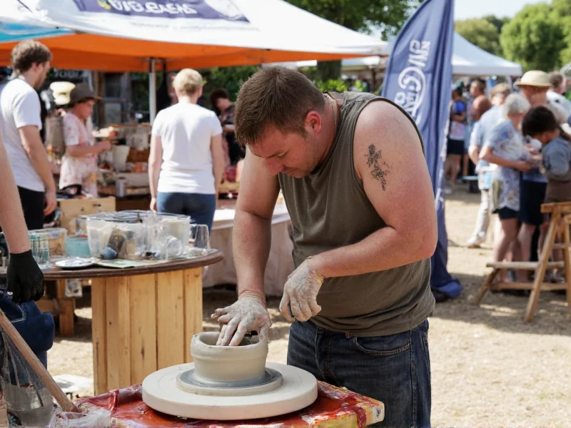 Artisan demonstrating pottery wheel at sunny outdoor craft fair