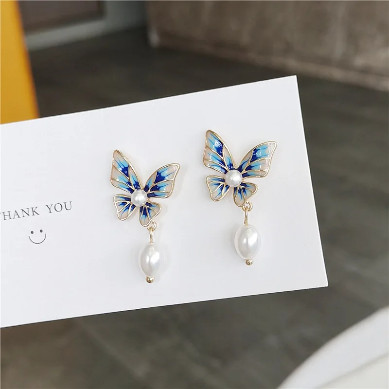 

Hot Selling Simple Pearl Butterfly Stud Earrings Cloisonne Butterfly Pearl Stud Earrings For Women