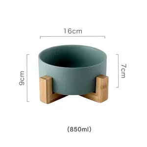Image of combined with bamboo frame and ceramic bowl Elevated pet bowl feeder Matte wooden frame pet bowl Pet food feeder