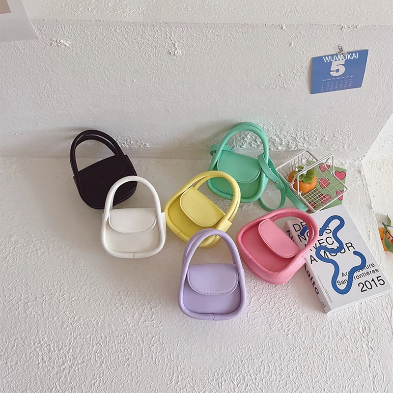 

Children's bag girls 2022 new baby candy-colored handbag foreign-style photo shape messenger bag lipstick coin purse