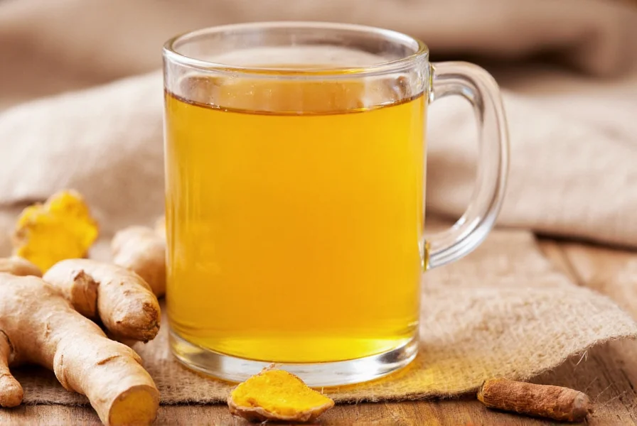 Fresh ginger and turmeric roots with tea preparation ingredients