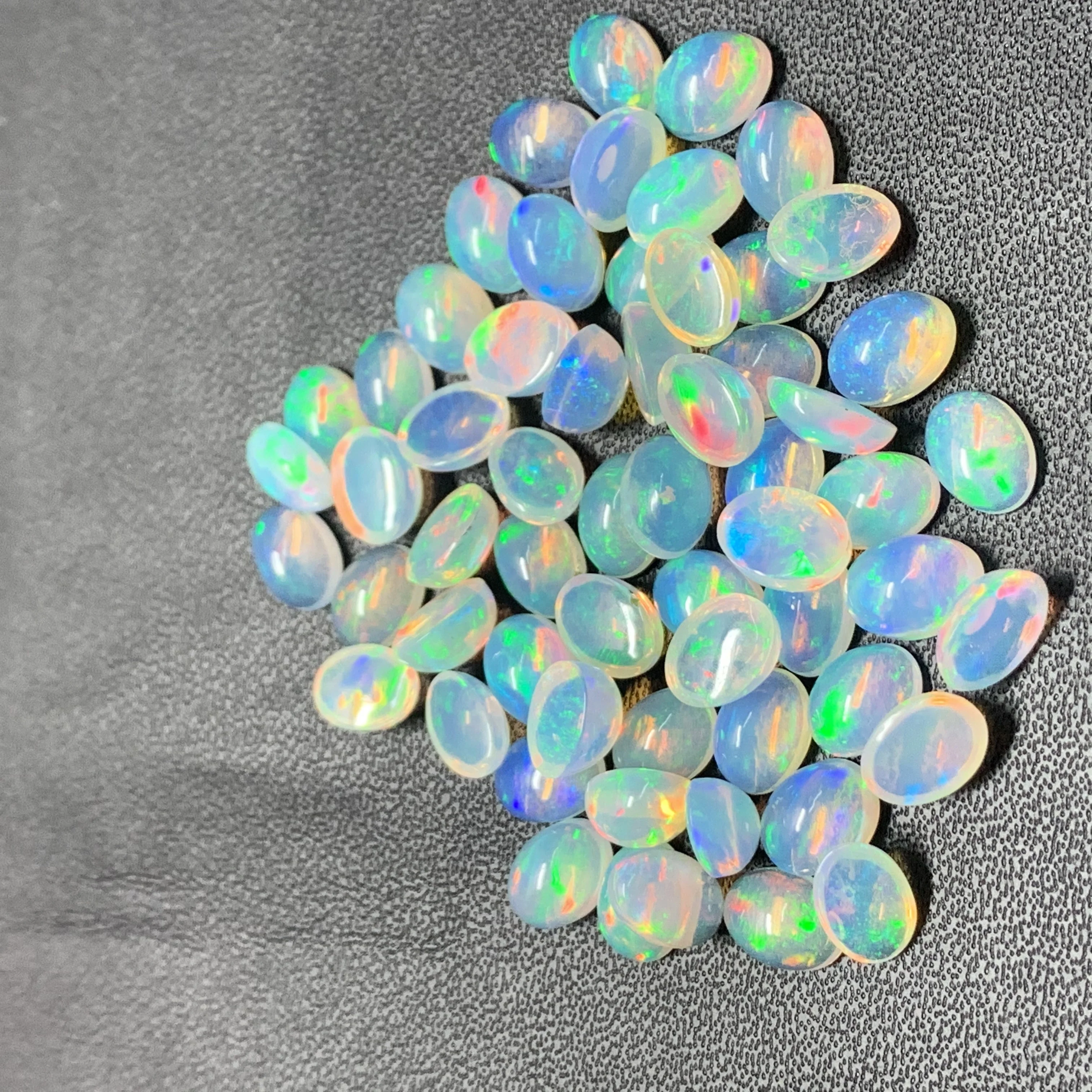 Best Quality Wholesale 3218 Natural Ethiopian Opal 1.45 Ct 5x7 mm Size Flashy Multi Fire Oval Shape Gemstone Smooth Loose Cabochon AAA