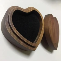 

Handmade heart shape walnut wood ring box with black lining