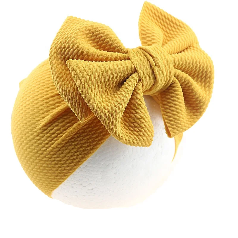 

2024 7" kid accessories bows Soft Elastic Waffle Headband Hot-sale Solid Color Top Knot Fashion Headwear For Baby Girl