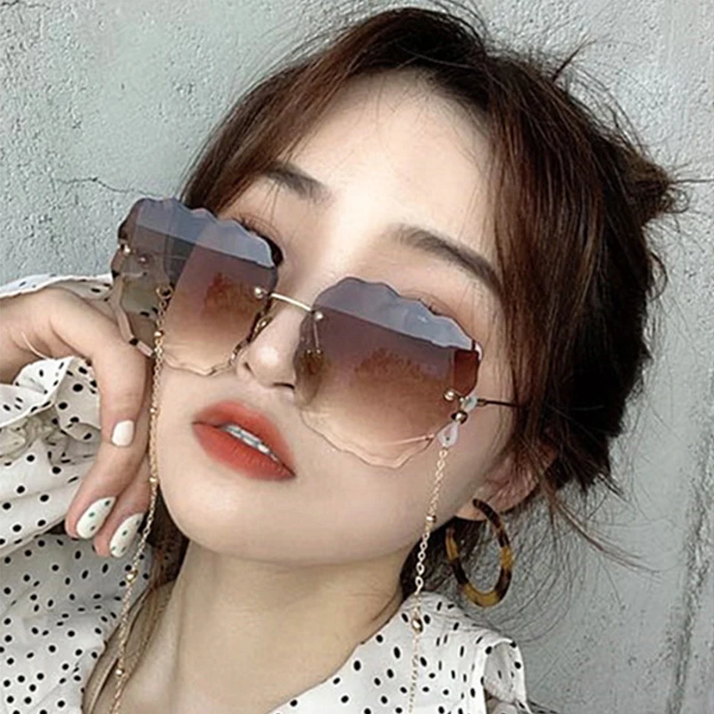 

Trendy Rimless Sunglasses For Women 2019 Fashion Flower Shaped Sunglasses
