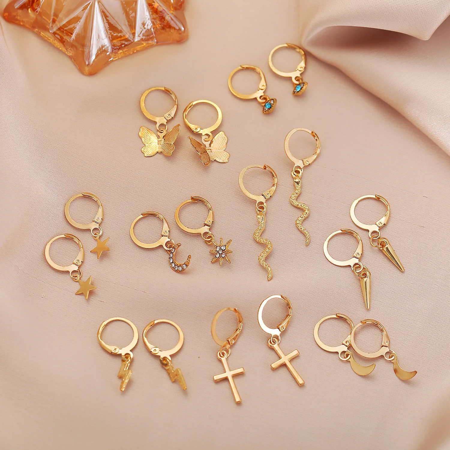 

wholesale gold plated moon star eye lightning cross snake butterfly ear clip on earrings rhinestone for women, Gold,silver
