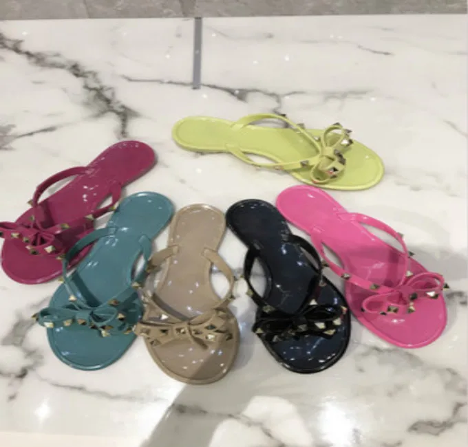 

Women Sandals Rivets Bowtie Flip Flops Studded Jelly Thong Sandal Rubber Flat Summer Beach Rain Shoes For Women