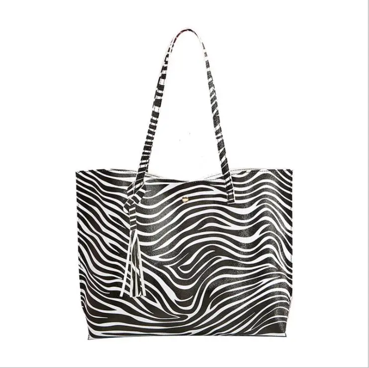 

High Quality luxury Messenger Leather handbag Casual Tassel Female Designer Vintage Big Size Tote women lady hand bag