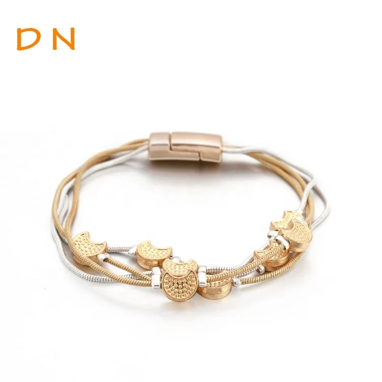 

Dina Fashion Woman Gold Plated Multi Layer Chain Moon Charms Bracelet Jewelry In France