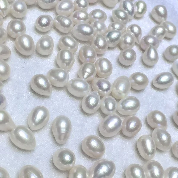 

6-7mm rice nature freshwater pearlloose pearl. AAquanlity HALF FULL AND NO HOLE