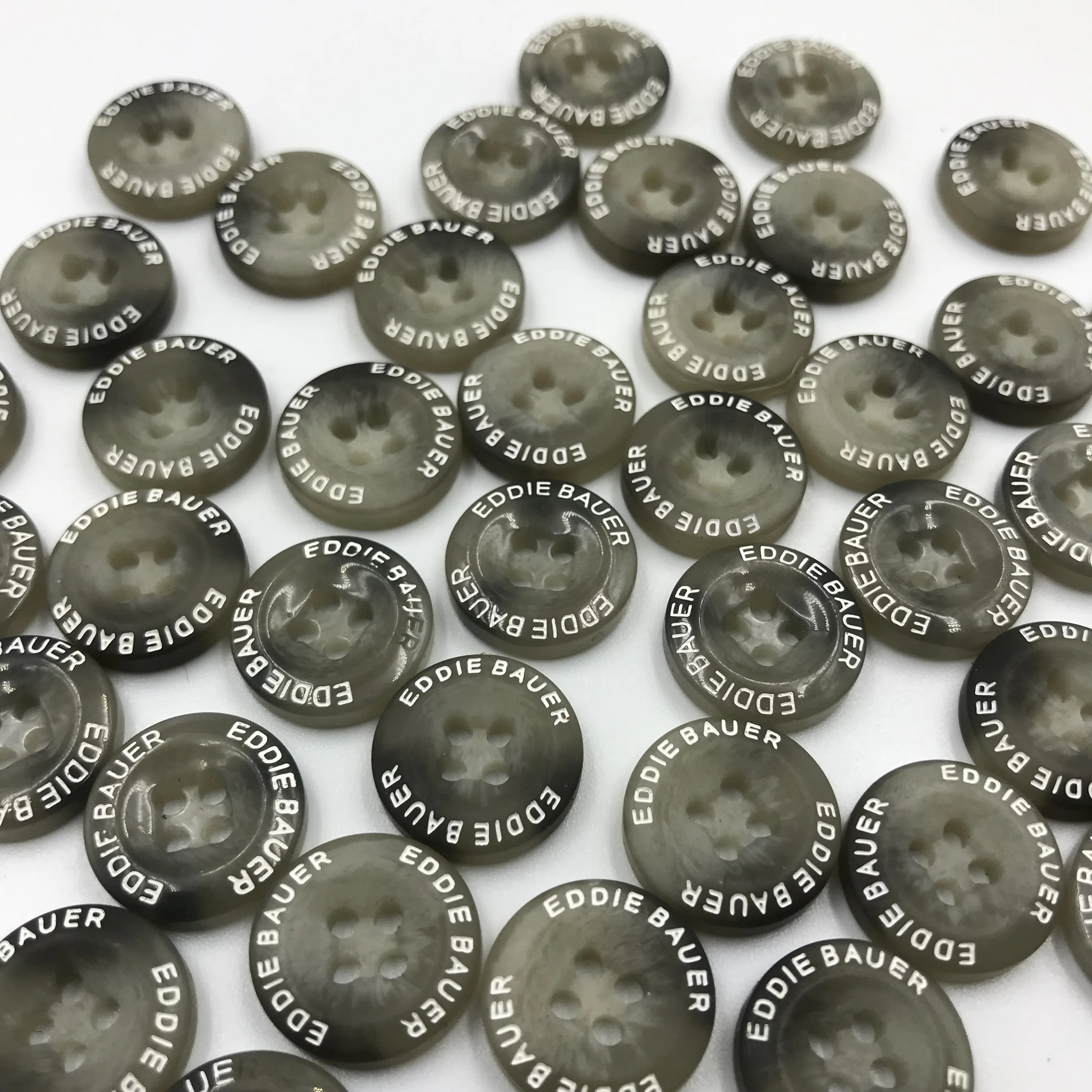 

custom logo 12L 4 hole Round horn button for shirts