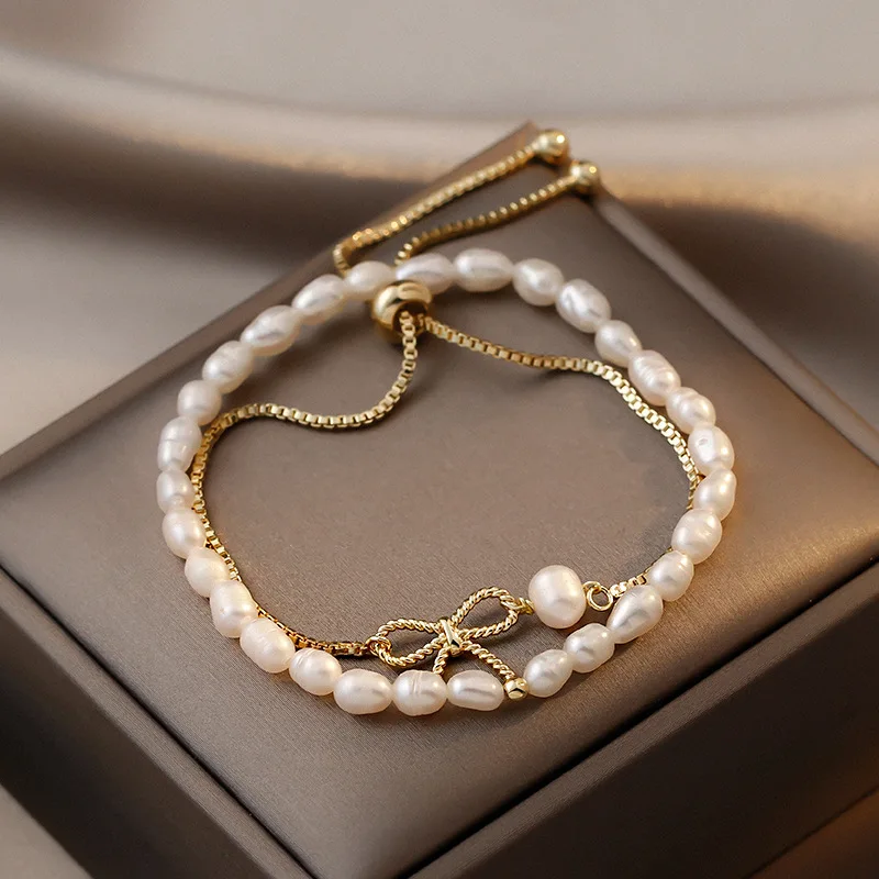 

fashion quality bowknot two layered freshwater pearl bracelet set