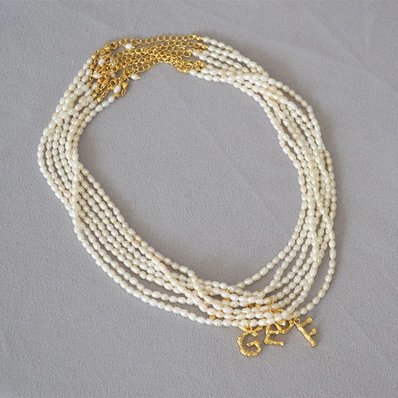 

2021 Atelier Studio original design handmade freshwater pearl with gold plated initial pendant letter necklace short choker