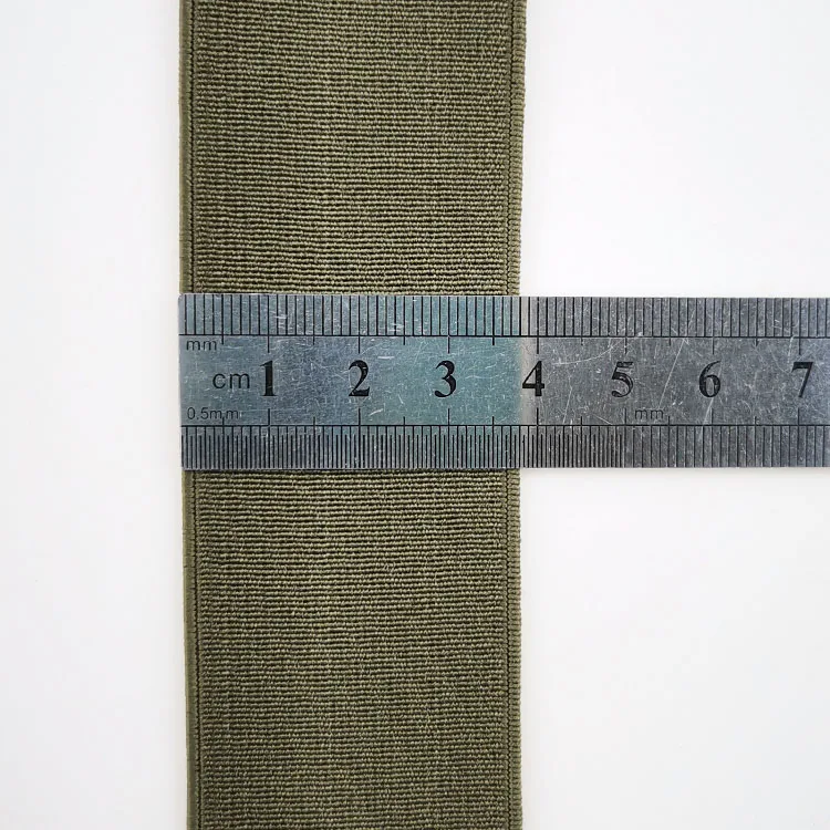 

Factory direct sale 38mm wide 1.5mm thick 450U light brown polyester Elastic band in stock high Elasticity military stretch tape