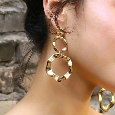 

Simple geometric business creative irregular personality glossy earrings
