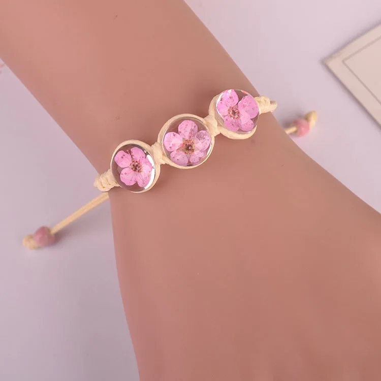 

Forest characteristic plant peach blossom dried flower bracelet glass ball immortal flower hand-woven real flower jewelry