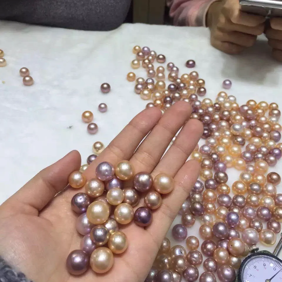 
wholesale bulk natural pearls for craft,rice ,baroque pearls,keshi ,round ,all pearls available 