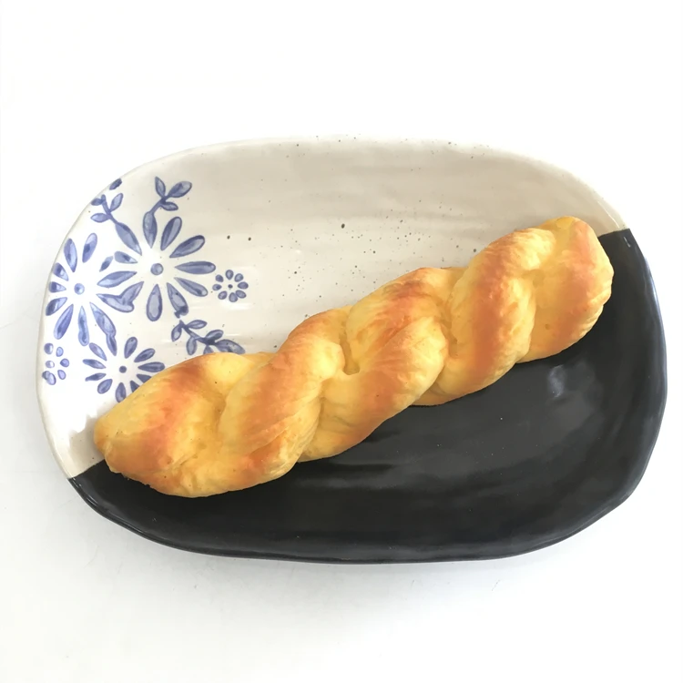 china wholesale restaurant fish dish antique oval large black and white ceramic plates in bulk.jpg