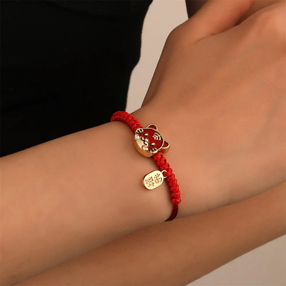 

Free sample collection new year's destiny fortune calling Nafu red hand rope national style cartoon woven tiger head Bracelet