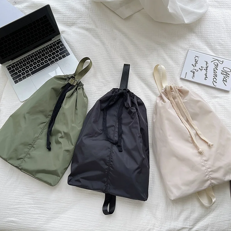 

New Korean female student fashion casual shoulder bag cross-body bag drawstring pleated large capacity nylon bucket bag