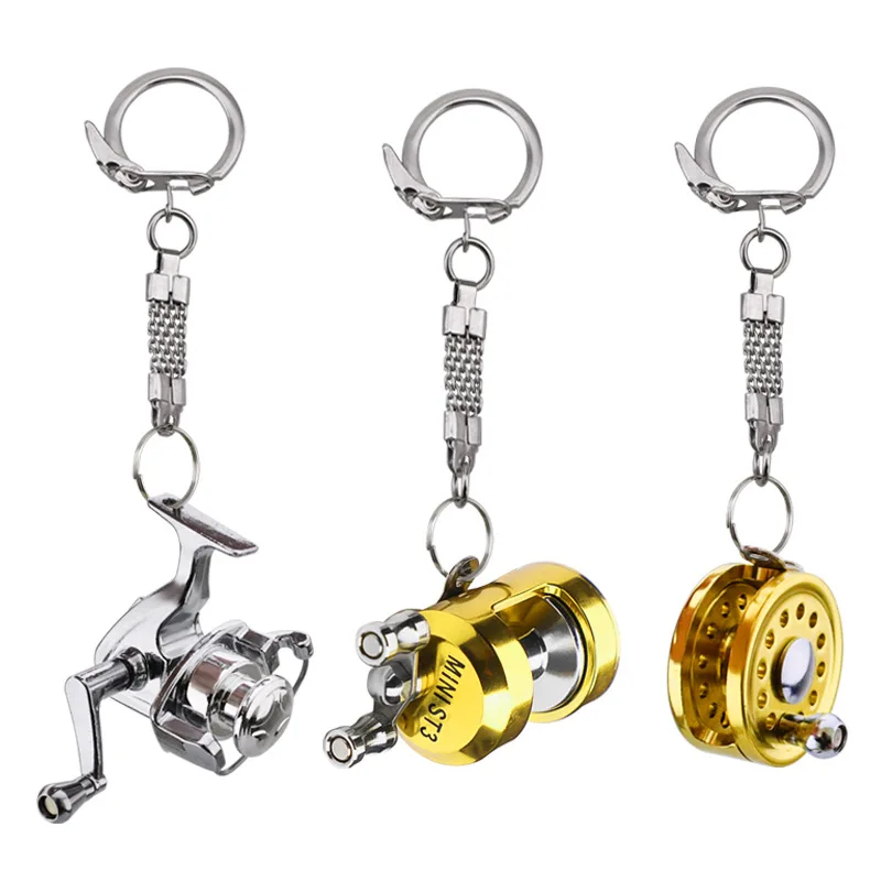 

2022 New Strong Fish Wheel Keychain Gold Color Fly Fisherman Spinning Fishing Reel Charactor Miniature Key Chain With Key Ring