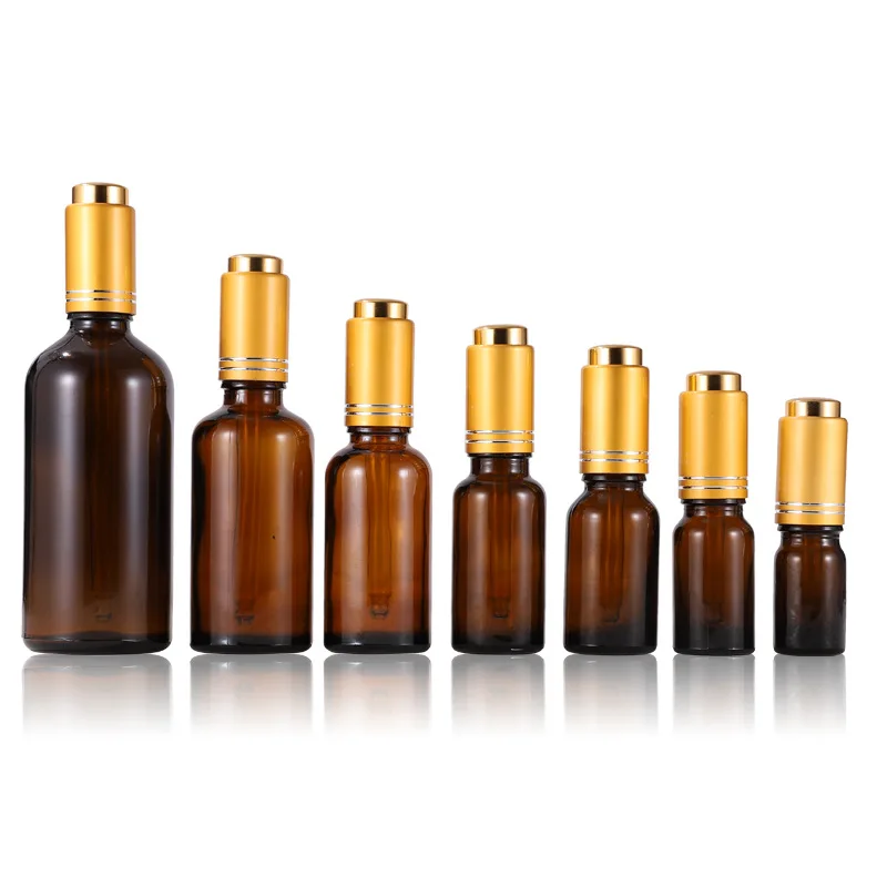 

Amber essential oil bottle with dropper glass dropper bottles 30ml with gold lid packaging essential oil bottle