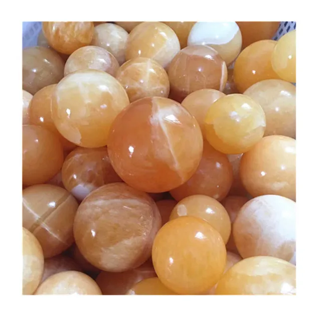 

Wholesale natural carved yellow calcite spheres gold frozen balls for home decorations