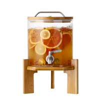 

Glass Drink Dispensers on Wooden Stand with Airtight Bamboo Lid and Stainless Steel Spigot