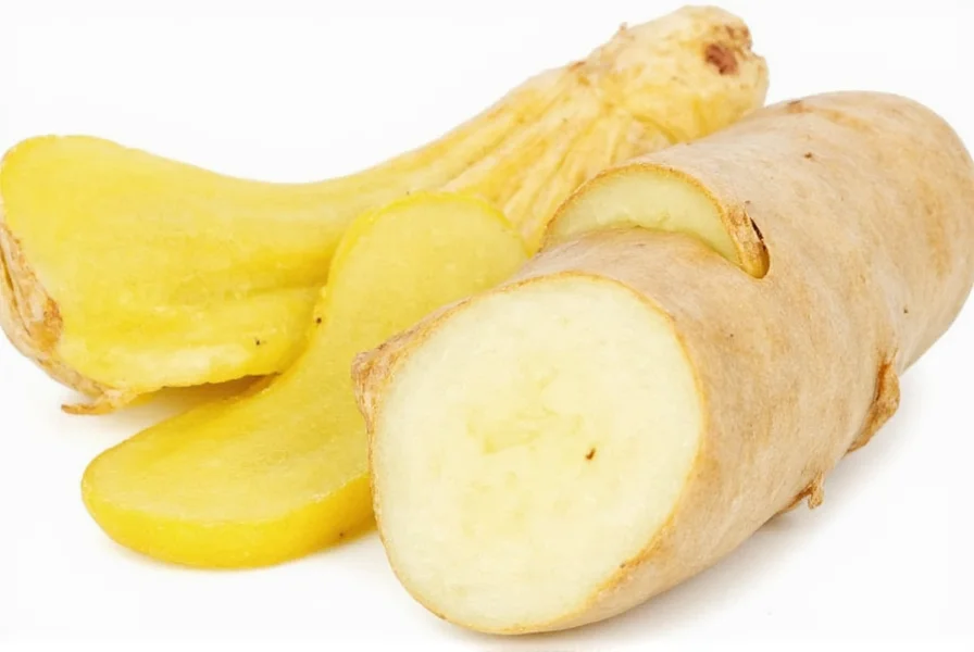 Fresh galangal root next to ginger for visual comparison