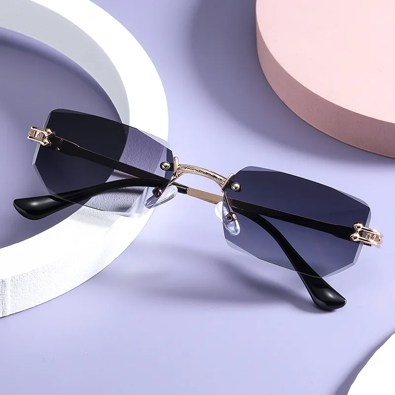

Good quality trendy women UV400 sunglasses square frame rimless sun glasses 2022