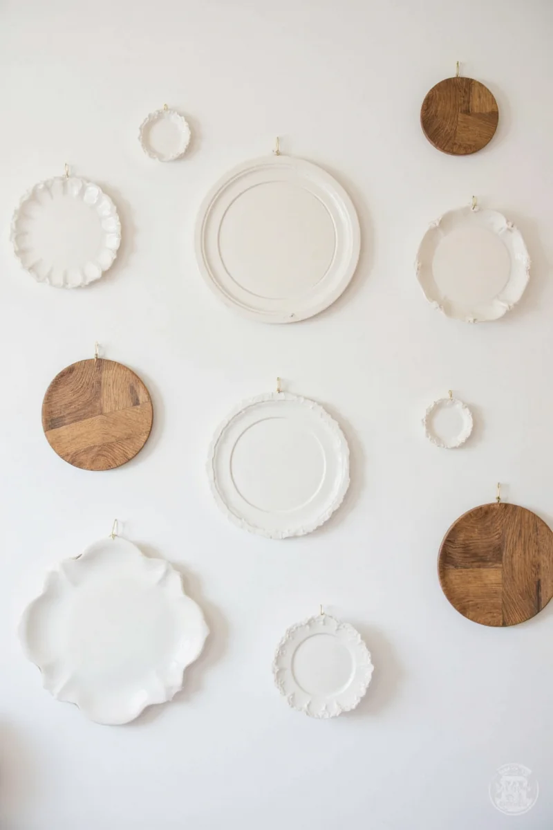 Vintage platters arranged beautifully on a living room wall