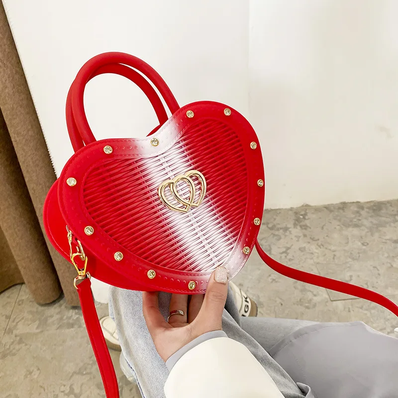 

Newest candy color women hand bags fashion rivet cross body purses heart shape unique women bag, As pics