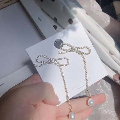 

Korea bow gold hoop plated silver earrings pearl fringe pendant earrings, As pic