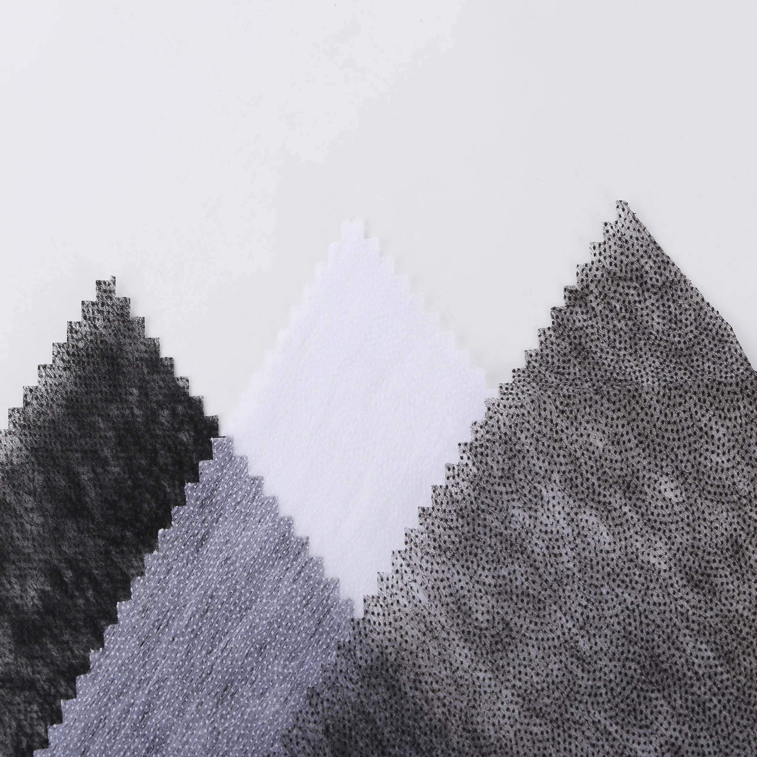 

100% polyester nonwoven interlining for garments interlining dot fuse, White black grey