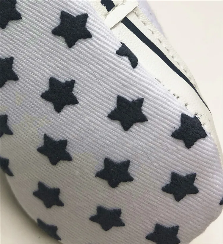 
wholesale white canvas baby shoe soft sole first walkers kid shoes 