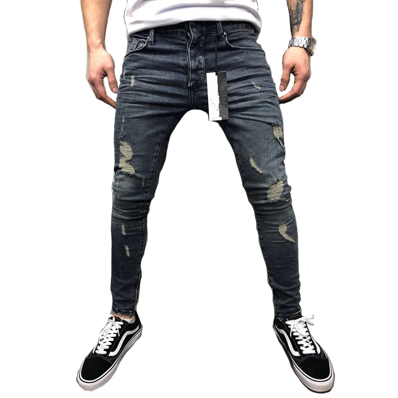 

Men's faded effect skinny fit mid-waisted jeans with ripped detail and five pocket