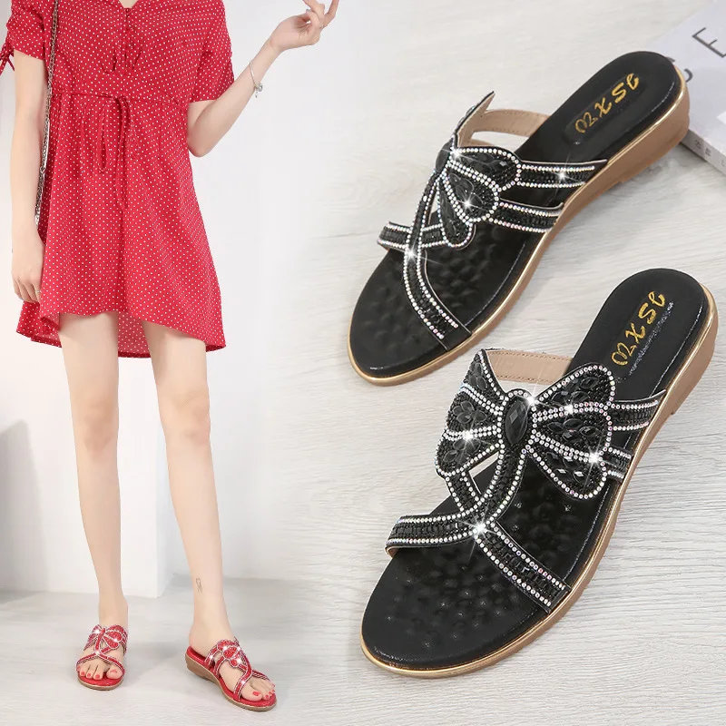 

S596 cross-border beach seaside metal rhinestone flat large size wholesale women's shoes Sandals