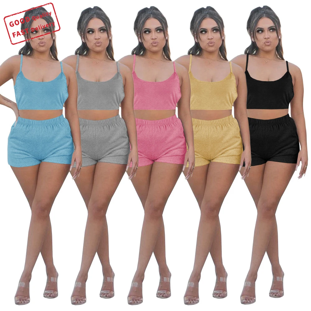 

GQ2818 hot sale women's two piece clothing set solid color crop top sling short two piece set sports casual two pieces set, Picture