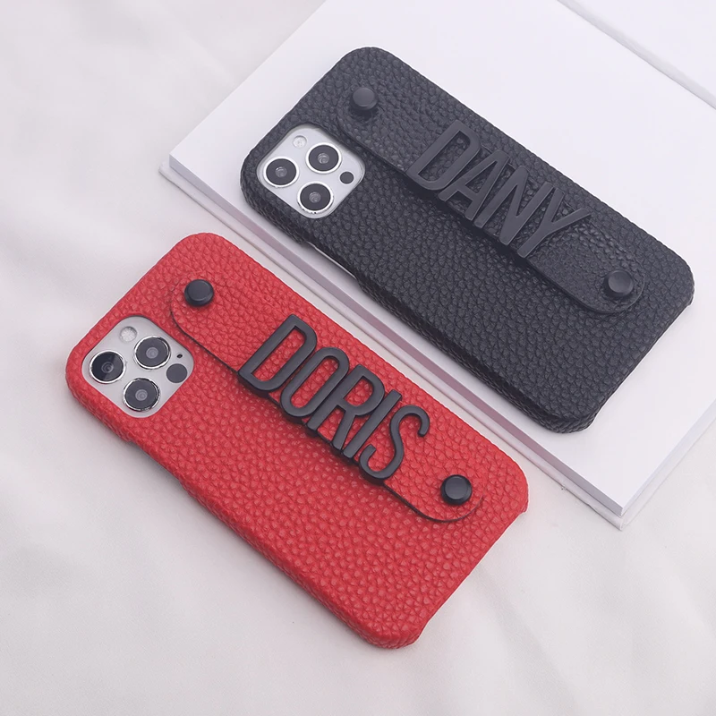 

Custom Black Letter Name Strap Pebble Leather Phone Case With Letter Charm