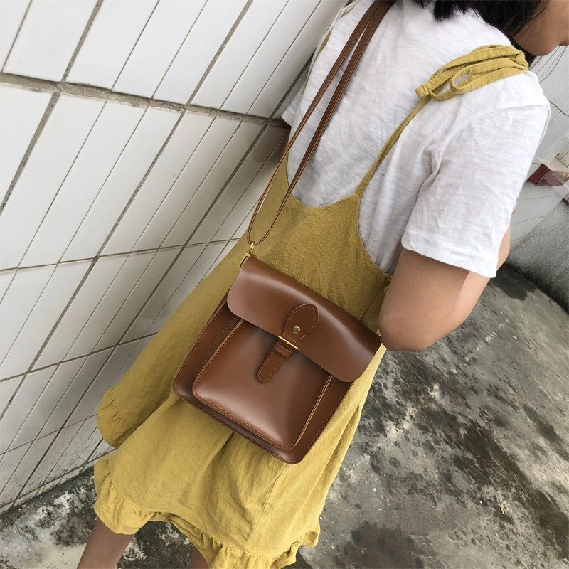 

Retro style PU leather pure color student sling bags for ladies wholesale