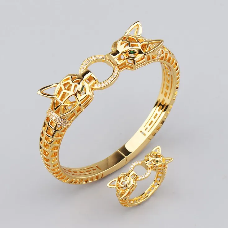 

The latest design fashion bracelet ring titanium steel 18K gold-plated leopard head hollow bracelet and ring