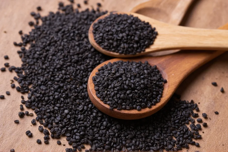 Close-up view of black seeds (Nigella sativa) on wooden spoon with measuring spoons showing proper culinary portions