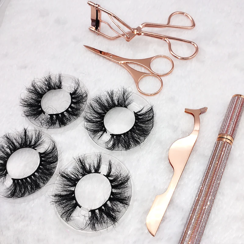 

High quality wholesale 25mm 6d mink lahes with mini suitcase custom eyelash packaging