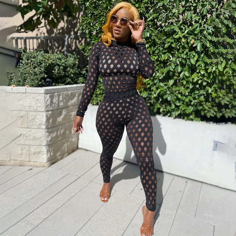 

Wholesale new trendy two piece pants women tracksuit set sexy perspective high collar broken hole knitted mesh clothing winter, Photo shows