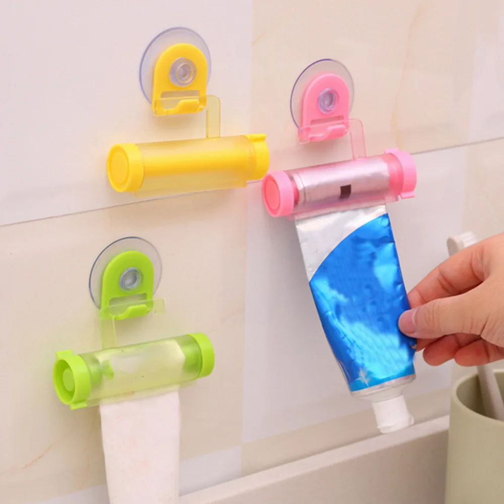 

Multipurpose Cartoon Heart Shape High Quality Kitchen Supply Tube Toothpaste Squeezer Roll Bathroom Gadget Rolling Plastic