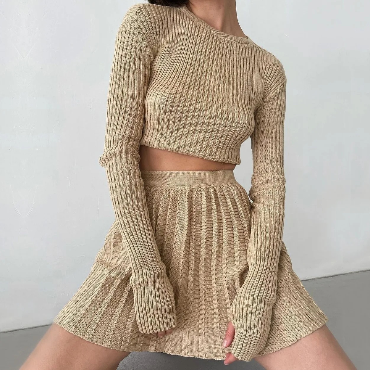 

2022 spring fashion appeal co ords women knitted 2 piece set long sleeve pleated knit co ord set 2 piece sweater skirt set