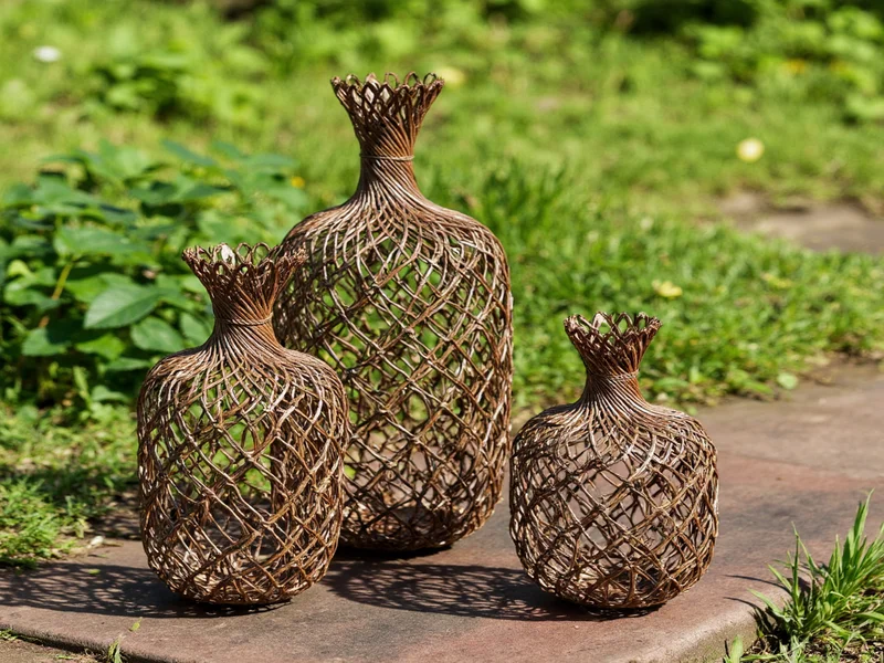 Finished vine crafted home decor pieces on natural background