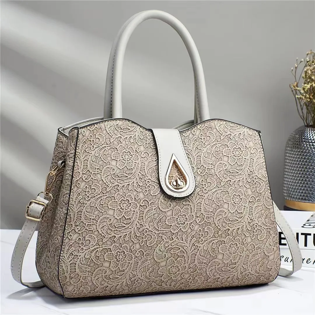 

Hot Selling Embroidery Pattern Woman Handbags Flap Lock Large Capacity Woman Purses Top Quality Raised Pattern Leather Bags